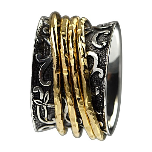 Ring mit 4 freilaufenden vergoldeten Ringen 1